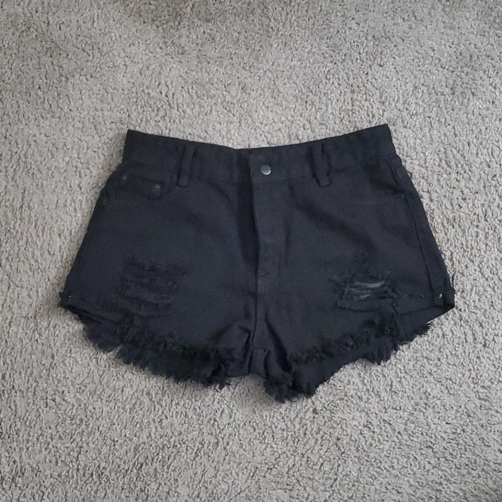 Black distressed shorts